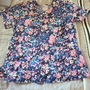Navy and pink floral print scrub top